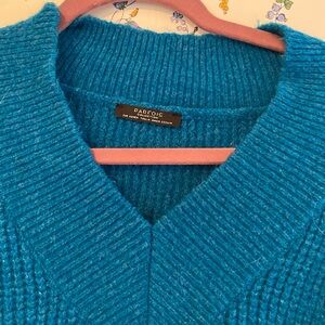Vibrant blue sweater with no use. Super cozy.